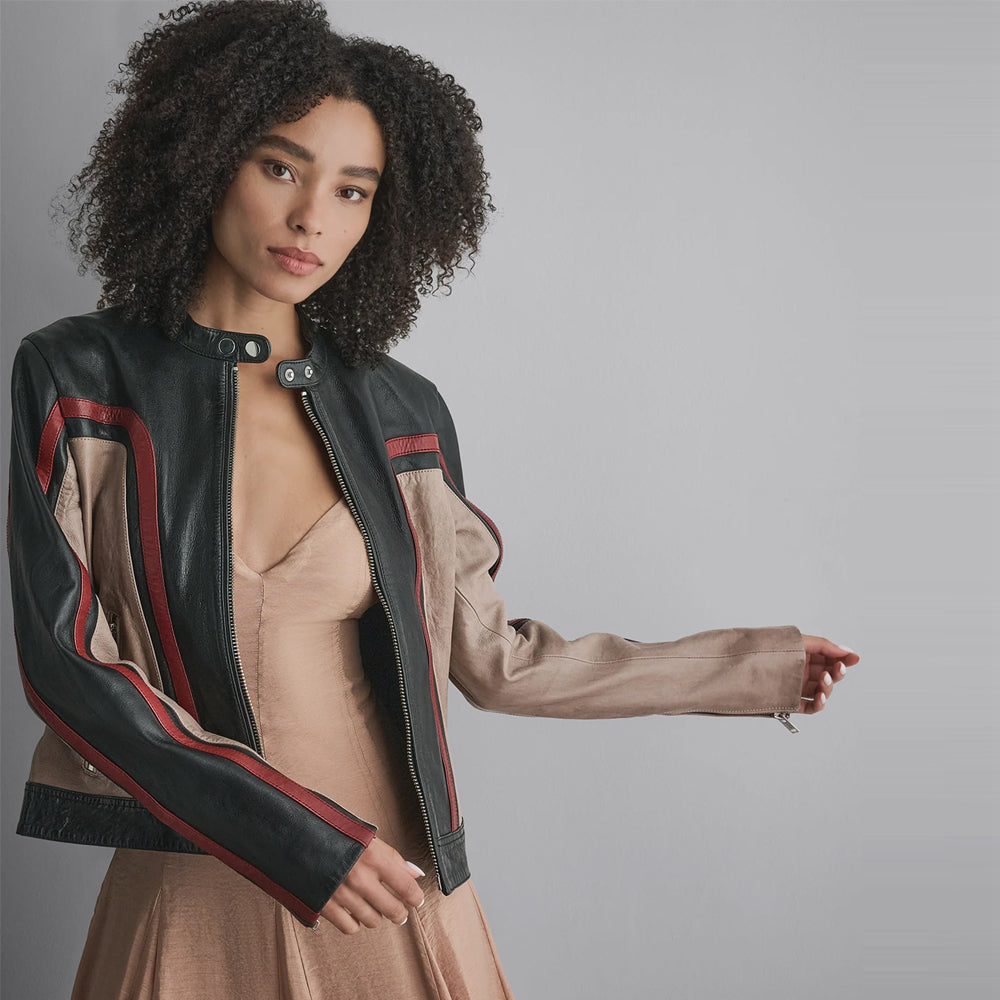 Women’s taupe, black and burgundy leather moto jacket showing snap-tab neckline, curved racing panels and zip cuffs