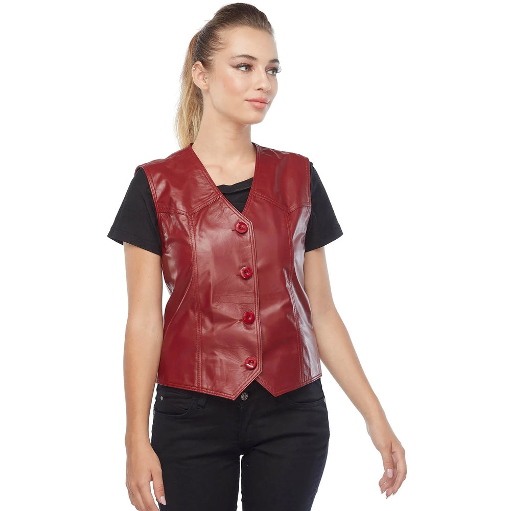 Half-turn studio view of a woman styling a deep crimson vegetable-tanned leather vest.