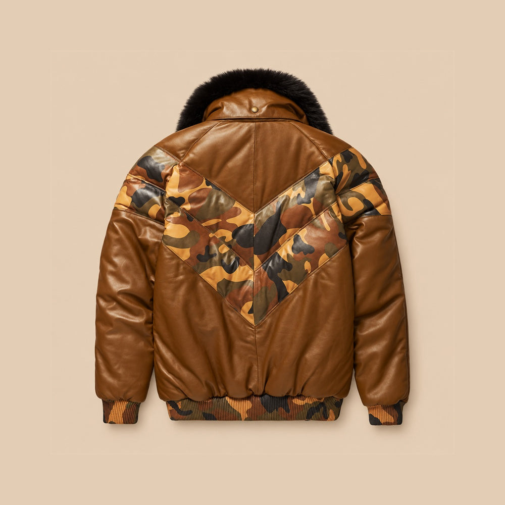 Back view of cognac leather V-Bomber with layered woodland camouflage chevrons, pointed yoke, center seam and patterned rib-knit waistband.